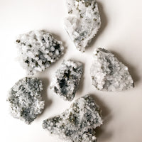 Pyrite in Quartz Clusters